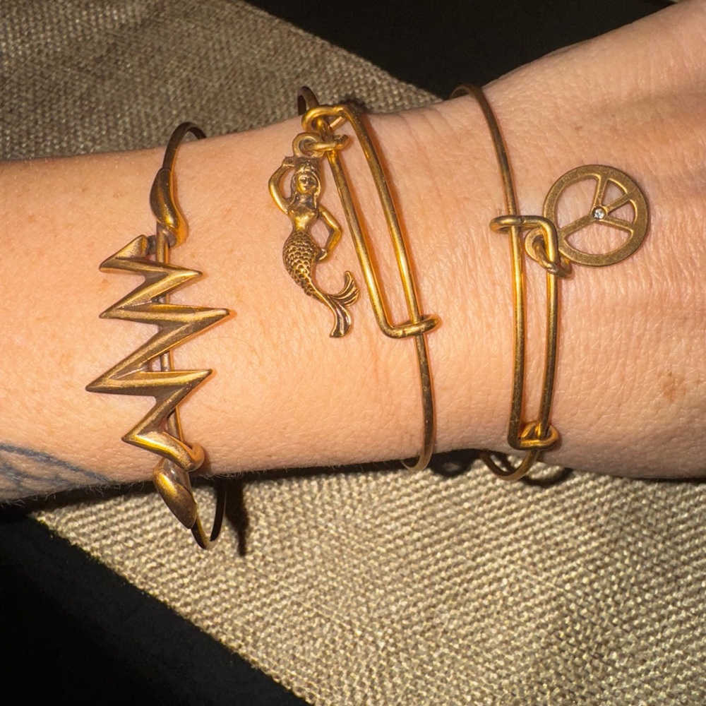 Trio of Alex ‘n Ani bracelets. Gold tone. Mermaid/World peace/ Zig zag🙃